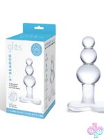 Graduated beaded clear glass butt plug with tapered T-base by Glas