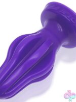 Large eggplant purple finned silicone plug with flexible collapsing fins by Oxballs