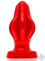 Large red finned silicone plug with flexible textured fins by Oxballs