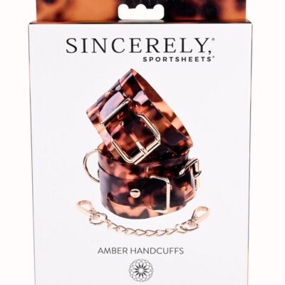 Adjustable brown tortoiseshell-inspired handcuffs with gold-plated accents by Sportsheets
