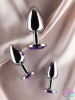Three progressive silver silicone anal plugs with rhinestone gem bases by Edonista