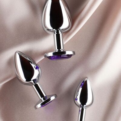 Three progressive silver silicone anal plugs with rhinestone gem bases by Edonista