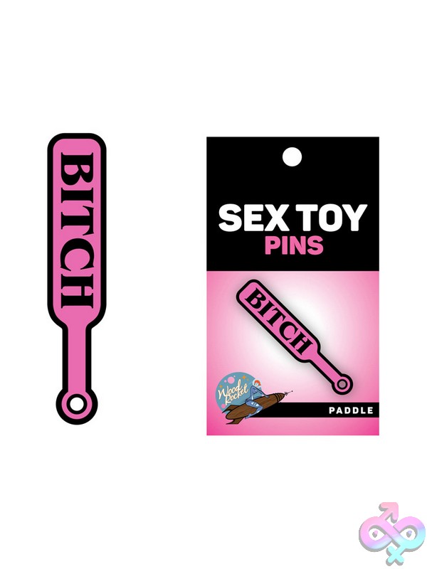 Discreet-Toys-Bitch-Paddle-Pin-Nu-Ept-011 Pink Soft Enamel Paddle Lapel Pin With Black Text By Wood Rocket