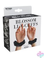 Blossom Luv Cuffs flower handcuffs in black and red with chain and keys on white background