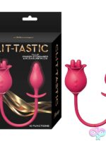 Clit-Tastic Tulip Finger Massager and Pleasure Plug in pink and yellow silicone on a soft neutral background