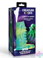 Creature Cocks tentacle squirting silicone penis enhancer in green and purple on neutral background