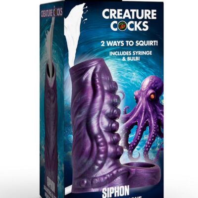 Creature Cocks tentacle squirting silicone penis enhancer in green and purple on neutral background