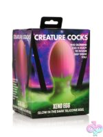 Glow in the dark pink purple green textured silicone egg by Creature Cocks Xr Brands