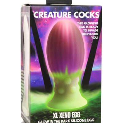 XL glow-in-the-dark pink silicone xeno egg with ribbed texture by Creature Cocks