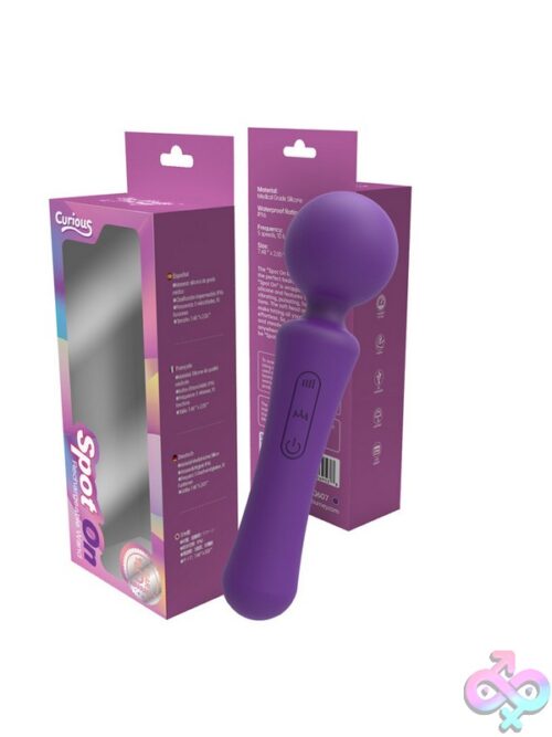 Curious Spot On Rechargeable Mini Wand Vibrator In Pink And Purple On A Soft Neutral Background