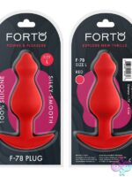 Pointee large silicone anal plug in black and red on a neutral background