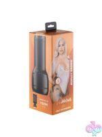 Realistic black TPE stroker molded from Ashley Barbie by Kiiroo