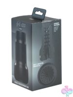 Compact black textured pocket stroker in body-safe TPE by Kiiroo