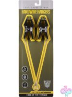 Adjustable black metal nipple clamps with silicone pads and aluminum O-ring by Doc Johnson