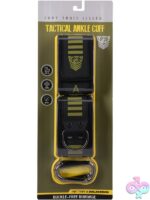 Tactical ankle cuffs in black and green with neoprene lining and Velcro closure by Doc Johnson