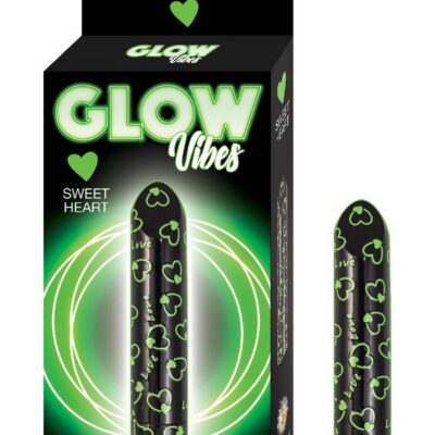 Heart-shaped glow-in-the-dark black bullet vibrator by Nasstoys, shown against a dark background highlighting the luminous effect