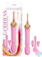 Goddess Elegance clitoral vibrator massager in pink and purple on a soft neutral background