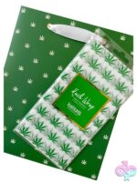 Polka dot green and white gift bag with white and green leaf tissue paper by Kushkards