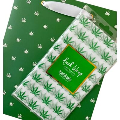 Polka dot green and white gift bag with white and green leaf tissue paper by Kushkards