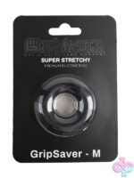 Medium black silicone cock ring by GripMaster GripSaver shown against neutral background