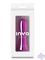Inya Shimmer metallic rechargeable vibrator in blue, multi, and pink on a soft neutral background