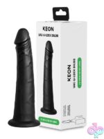 Black vacuum lock dildo compatible with Keon adapter by Kiiroo