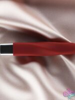 Layla 10-mode silicone twist bullet vibrator with flexible tip shown in black and red