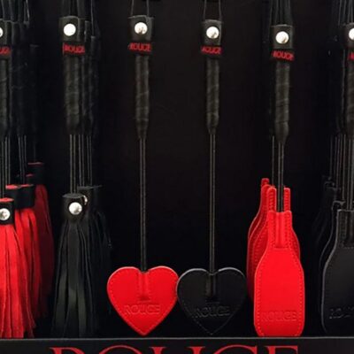 36-piece mini leather paddle and flogger counter display in Black and Red by Rouge Garments