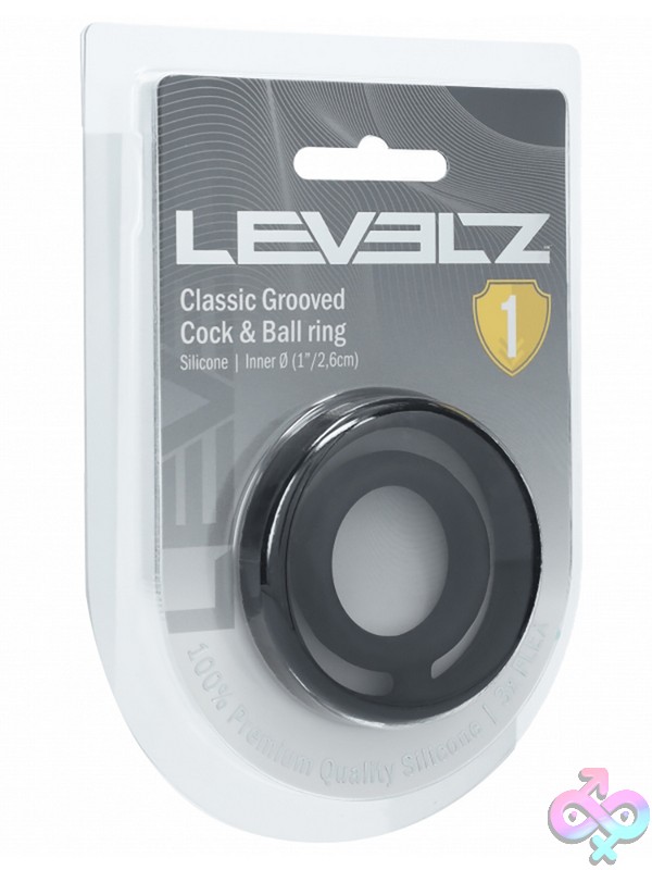 Discreet-Toys-Levelz-Classic-Grooved-Silicone-Cock-Ball-Ring-Black-Nu-St-Lvl01-0031Blk Grooved Black Silicone Cock And Ball Ring By Shots Toys Against A Clean Background