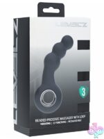 Vibrating beaded silicone prostate massager with ergonomic loop base in black by Shots Toys