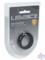 Wide O black silicone cock ring by Shots Toys shown against neutral background