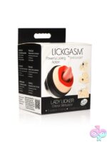 Beige silicone clitoral tongue stimulator with textured pink tongue and lip detail by Xr - Inmi