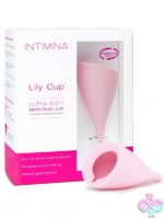Small pink reusable menstrual cup in medical-grade silicone by Intimina