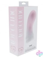 Loveline Mist finger vibrator in pink silicone shown on fingertip against soft background