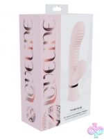 Loveline Mystique ribbed rabbit vibrator in pink and blue on a soft neutral background