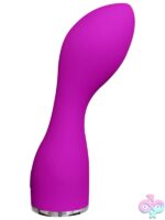 Luma G-spot vibrating wand in pink and purple on a soft neutral background