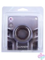 Maia Gunner stretchy silicone cock ring on neutral background, available in beige and black