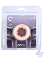 Maia Gunner stretchy silicone cock ring on neutral background, available in beige and black