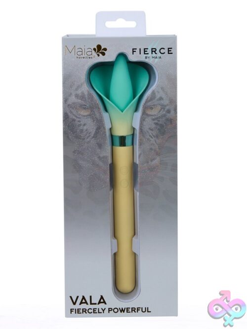 Maia Vala Silicone Flower Clitoral Vibrator In Purple And Beige On A Soft Neutral Background