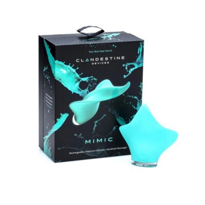 Ergonomic seafoam silicone clitoral massager with LED base by Clandestine