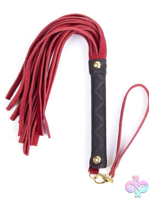 Mini Leather Flogger With 30 Tails And Wrapped Handle In Black, Shown On Neutral Background