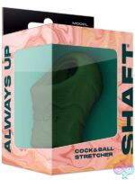 Shaft Model P liquid silicone cock and ball stretcher in gray and green on neutral background