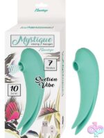 Mystique dual-motor suction vibe in pink and green body-safe silicone