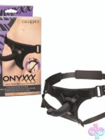 Adjustable black jock strap harness with curved silicone probe and metal rings by California Exotic Novelties