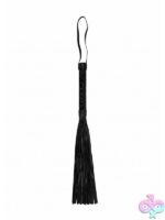 Black faux leather impact whip with flogger tails and secure grip handle by Shots Toys