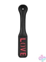 Firm flexible black stitched leather LOVE imprint paddle by Shots Toys