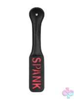 Firm flexible black stitched leather spanking paddle with reversed SPANK embossing by Shots Toys