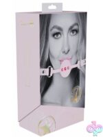 Pink silicone ball gag with iridescent metal hardware and adjustable bonded leather straps by Shots Toys