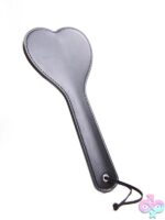 Black heart-shaped PVC vegan leather spanking paddle with metal stiffener by S&G Pleasure