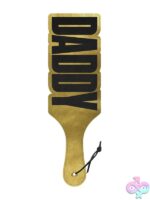 Textured gold cut-out spanking paddle with polyurethane surface by Wood Rocket